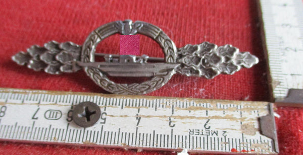 Marine Kriegsmaine U-Bootfrontspange in Bronze mit HK Orden Spange