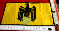Brassard Deutsche Reichsbahn (DR) avec aigle du Reich et svastika – Chef, Jaune | Reproduction de collection Militaria