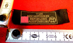 SS Stoff-Etikett „Reichsführer SS“ – RZM-gemarkt, ca. 8×3 cm, Original | Art.-Nr. 34523